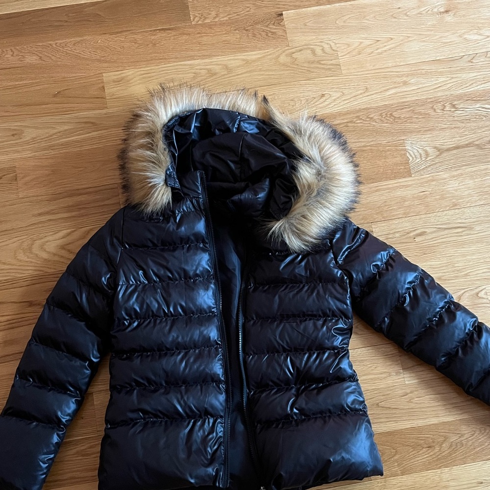 Black puffer jacket (no brand)